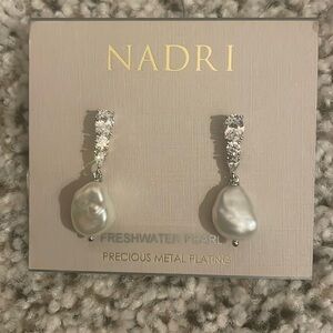 Brand New Nadri freshwater pearl earrings. Precious metal plating